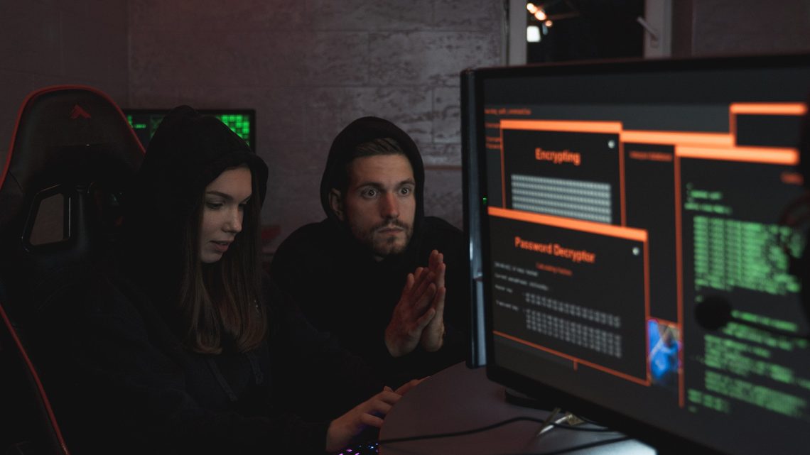 computer hackers man and woman