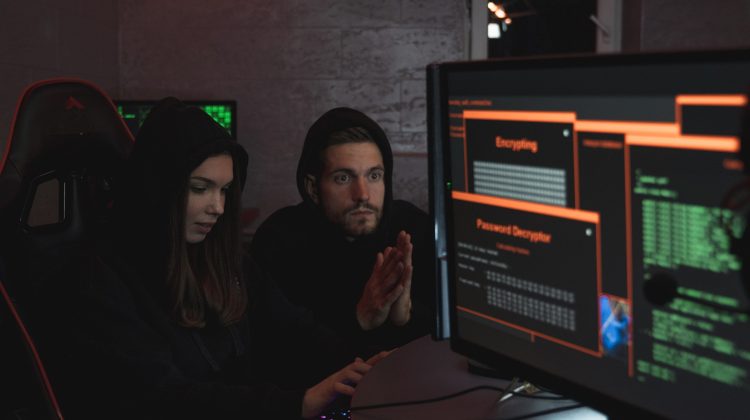 computer hackers man and woman